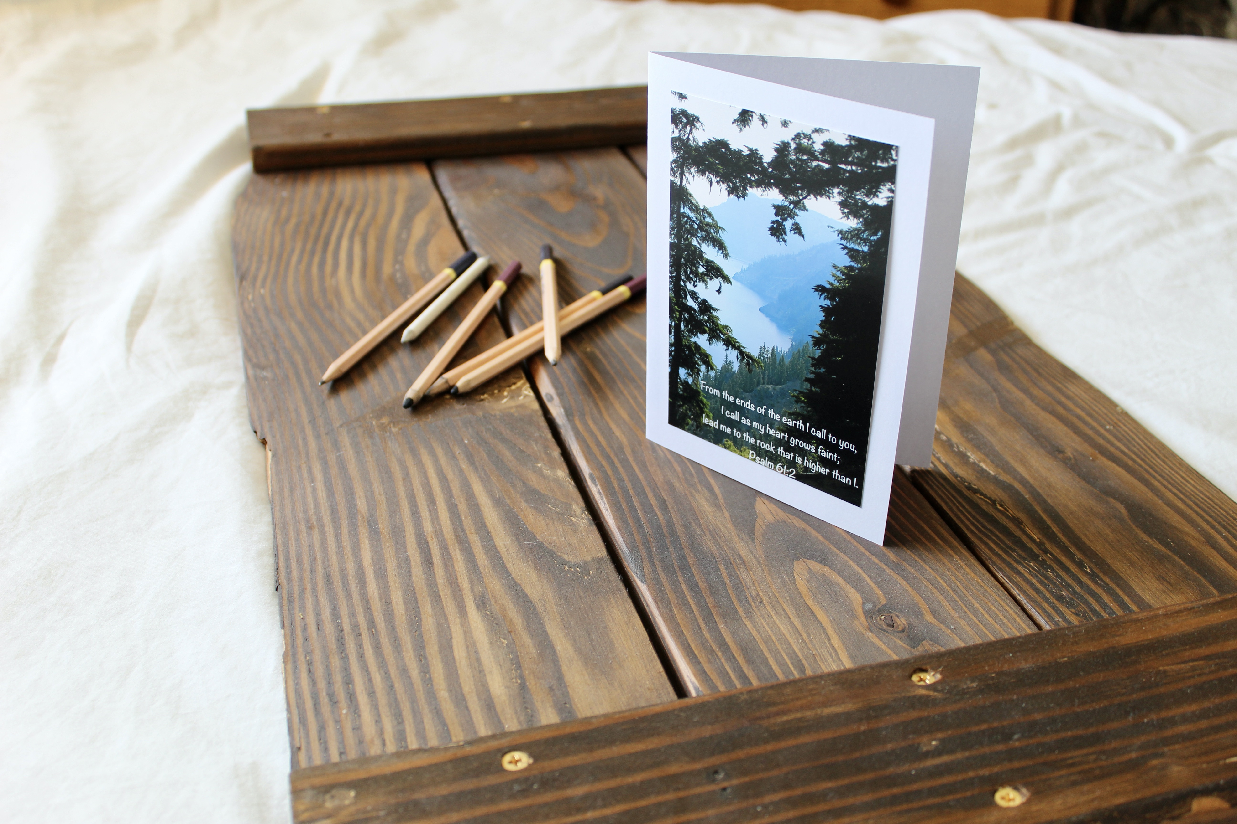 Greeting card on a tray with pencils